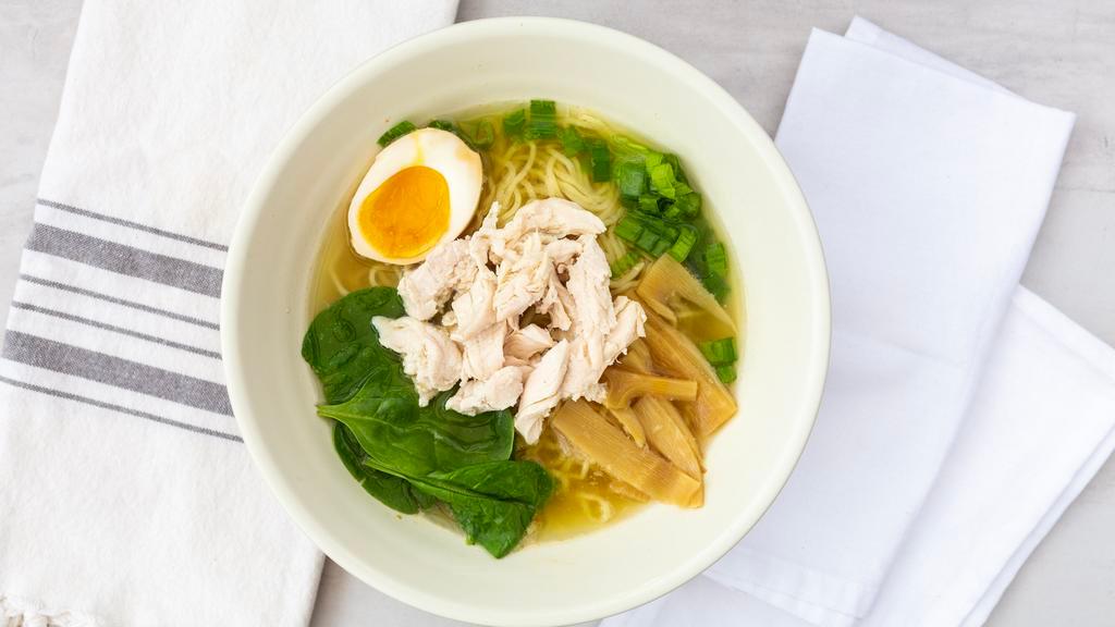 Chicken Shoyu Ramen · Shoyu broth (a light chicken broth with a hint of soy), chicken breast, soft-boiled egg, bamboo shoots, greens and scallions.