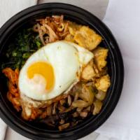 Bibim Rice · Most popular. Bean sprouts, kimchi, spinach, corn, shiitake mushrooms and caramelized onions...