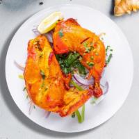 Chicken Tandoori · Fresh chicken legs and thigh, marinated in our special housemade tandoori masala, lemon juic...