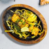 Tikka Hit (Paneer Kebab) · Indian cheese cubes marinated in our housemade kabab masala, lemon juice, red-yellow onions,...