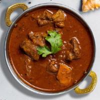 Lamb Vindaloo · Tender and boneless lamb traditionally cooked with potatoes, our housemade curry masala, ext...
