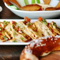 Chicken Boxty Quesadilla · Two potato boxties filled with chicken, pico, pepper jack, drizzled with chipotle aioli & so...