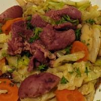 Corned Beef & Cabbage · private butcher corned beef, buttered cabbage, carrots and potatoes with a creamy white wine...