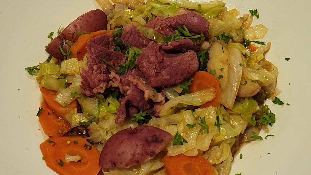 Corned Beef & Cabbage · private butcher corned beef, buttered cabbage, carrots and potatoes with a creamy white wine and mustard sauce