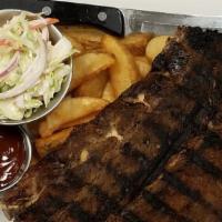 24 Hour Ribs · slow cooke din our house rub with your choice of our hand crafted sauces, served with slaw a...
