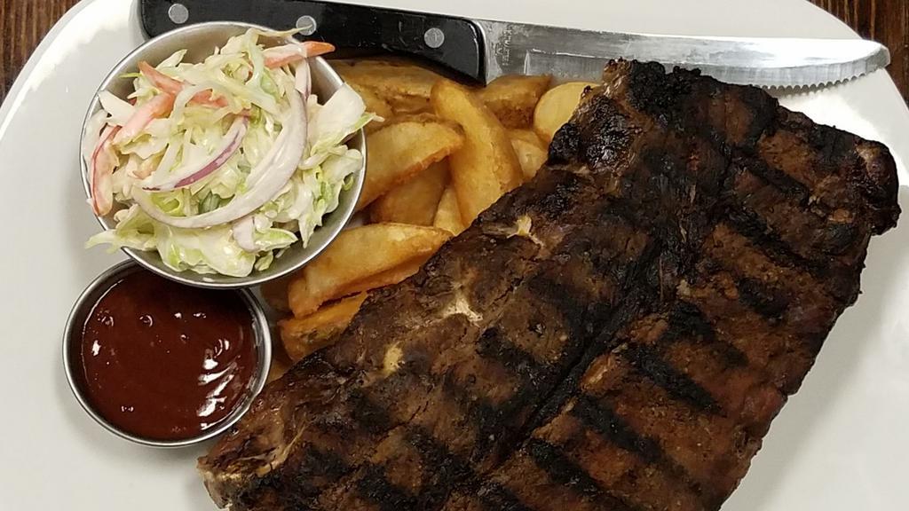 24 Hour Ribs · slow cooke din our house rub with your choice of our hand crafted sauces, served with slaw and chips