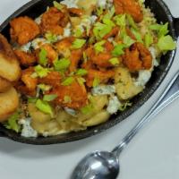 Buffalo Mac And Cheese · Our signature Guinness Mac and Cheese topped with crispy fried chicken tossed in buffalo, ce...