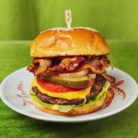 Bacon Burger · Turkey bacon cheeseburger with lettuce, tomato, pickles, caramelized onions and house sauce.