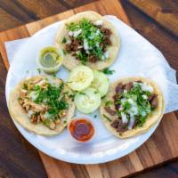 Tacos · With cilantro & onion.