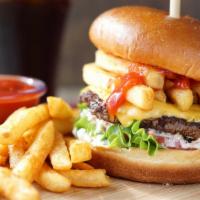 Beirut Burger · Double American cheese, lettuce, tomatoes, coleslaw, ketchup, French fries, and mayo. 