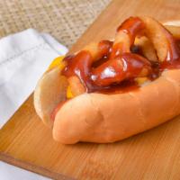 Rings Dog · Hot dog between fried onion rings, BBQ sauce, and nacho cheese.