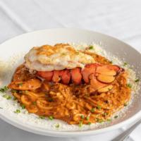 Seafood Diablo · This spicy seafood combo of shrimp, scallops and lobster, is sautéed in a tomato cream sauce...