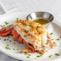 Lobster Tail 8Oz · Classically prepared and served with drawn butter and your choice of two sides. (PRICE SUBJE...