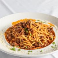 Spaghetti And Meat Sauce · Home made spaghetti meat sauce, served over pasta.