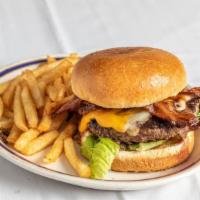 Steakhouse Burger · USDA ground beef grilled to you liking. Served with cheddar and Swiss cheese, sautéed onions...