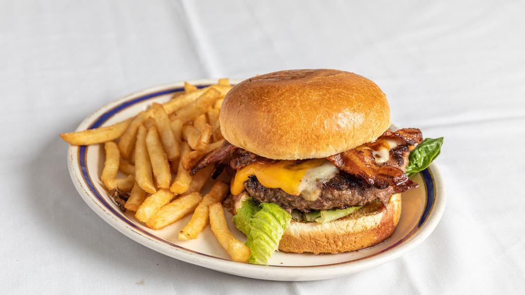 Steakhouse Burger · USDA ground beef grilled to you liking. Served with cheddar and Swiss cheese, sautéed onions with A1 sauce, bacon and fries.