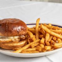 Smothered Chicken Sandwich · Grilled chicken breast topped with sautéed onions, peppers and melted Swiss cheese.