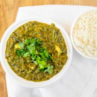 Palak Paneer · Spinach cooked with homemade cheese, garlic and ginger.