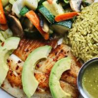 Tilapia Verde · Fresh Tilapia Filet seared a la plancha with Garlic and Lime served with Avocado, Latin Stir...