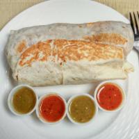 El Jefe Burrito · The boss burrito is enough to fill any appetite. It’s steak and chorizo topped with beans, r...