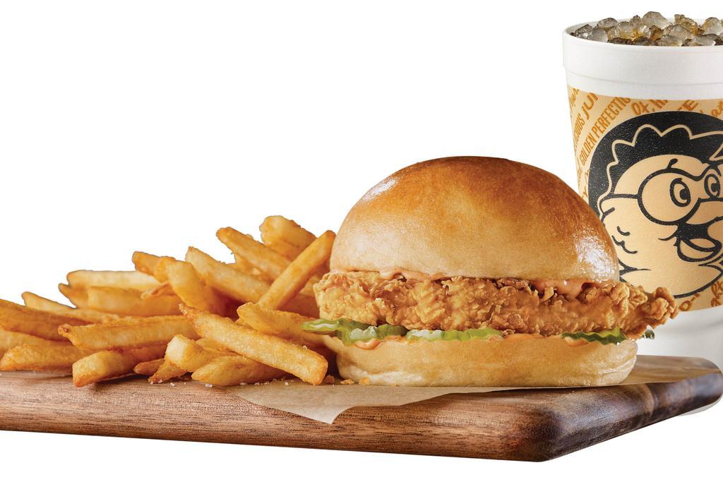 Big & Golden Chicken Sandwich · A big crispy marinated breast filet, topped with our spicy Lotta Zing® sauce, 5 dill pickles slices all on an extra-large, freshly baked yeast roll