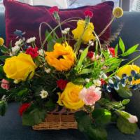 Basket Arrangement · Flowers: 1 Sunflower, 5 Yellow Roses, 2 Yellow Billy balls, Mini Carnation Light pink and Re...