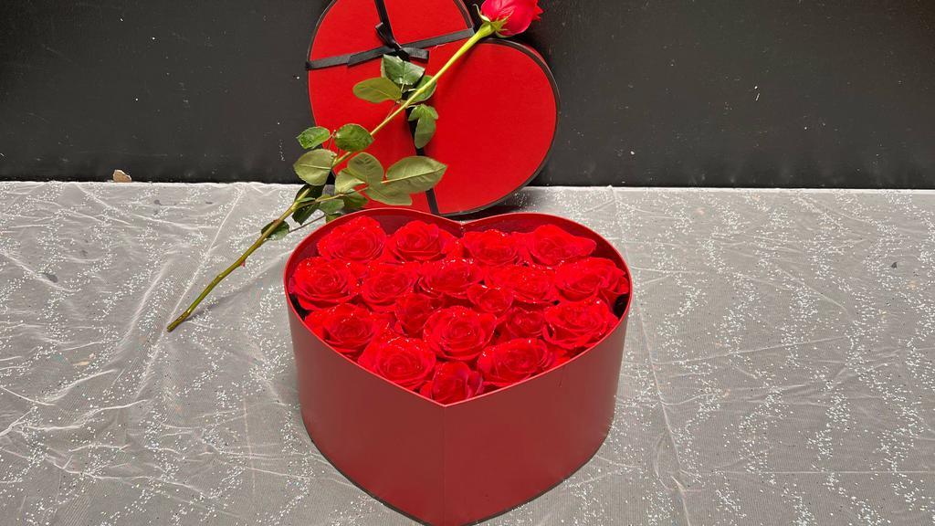 Heart Red  · Red Heart Box size 6 in H x 12 in W

Fresh Beautiful Red Roses with design the Red Heart Box.