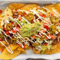 Jefa Nachos · Nachos include: choice of meat, beans, cheese, lettuce, tomato, sour cream, guacamole,
and j...