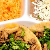 Taco Dinner(3 Tacos)  · Side of rice and beans 
Or rice and fries