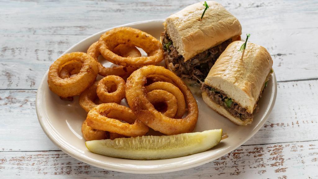 Philly Cheese · Sliced sirloin with Swiss cheese, green peppers & onions on hoagie roll. Add mushrooms for an additional cost.