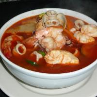 Caldo De Camarón · Shrimp soup w/guajillo stock & fresh vegetables.