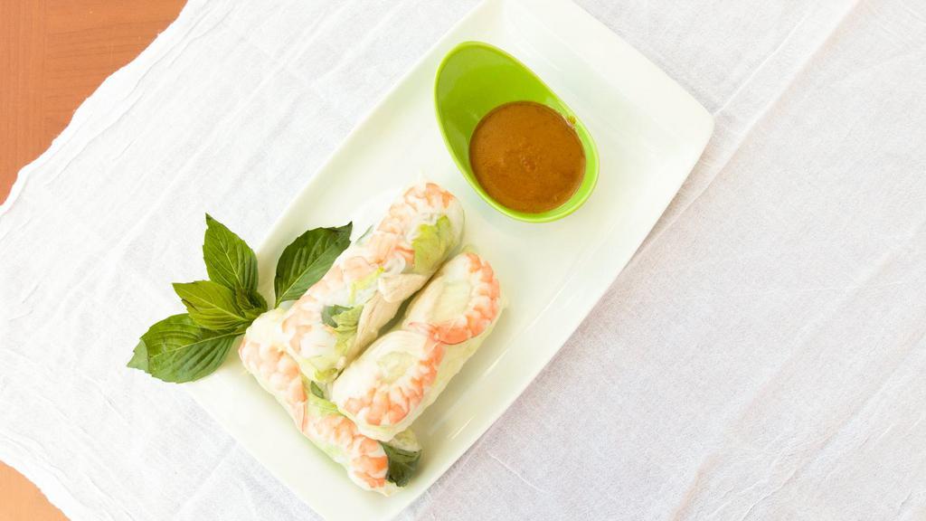 Fresh Spring Rolls (3) · 3 pcs Rice paper wrapped with shrimps, chicken, vermicelli noodle, lettuce, carrots, bean sprouts, mints and cilantro with creamy peanut sauce.