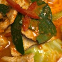 Panang Curry · Choice of meat with panang curry paste with bell peppers, peas, green beans and kaffir leave...