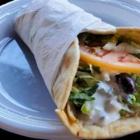 Spartan Chicken Wraps · Marinated chicken breast, tzatziki sauce, scallions, tomatoes, feta cheese, romaine lettuce,...