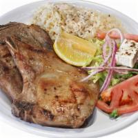 Pork Chops · Two thin cut pork chops, seasoned and grilled to your delight (20 minute cook time)