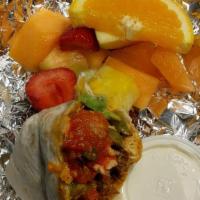 #17 Breakfast Burrito · Scrambled eggs, cheddar, green pepper and onion with avocado and wrapped in flour tortilla, ...