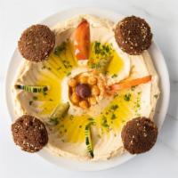 Wally'S Falafel And Hummus Plate · Vegetarian Dish. Tradition on a plate. Four pieces of falafel on top of our homemade hummus ...