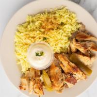 Chicken Shawarma Plate · Chicken shawarma meat served with side salad, one garlic sauce and your choice one option of...