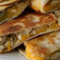 Chicken Quesadillas · A giant flour tortilla grilled and stuffed with strips of grilled chicken breast, onion, moz...