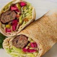 Beef And Lamb Kifta Kabob Sandwich · Grilled ground cuts of minced beef and lamb served in a wrap with tomatoes, onions and tahin...