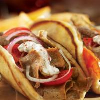 Spicy Gyros Sandwich · Chicago style gyros served with tomatoes, onions and tzatziki sauce. Spicy.