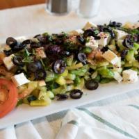 Salam Mediterranean Salad · Cucumbers, tomatoes, lettuce, sweet peppers, black olives, mixed with home dressing and topp...