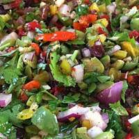 Egyptian Salata Baladi · The typical salad in Egypt, made from tomatoes, cucumber, sweet peppers, lettuce, green and ...