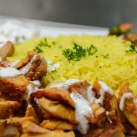 Chicken Shawerma Entree · Thin slices of marinated chicken cooked on revolving rotisserie.