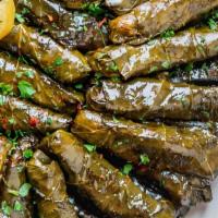 Stuffed Grape Leaves With Rice And Meat Dawali Dolma (New Item) · Stuffed Grape Leaves With rice, ground beef and lamb, cooked in our special lemon sauce and ...