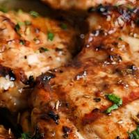 Grilled Chicken Thighs (New Item) · GRILLED BONELESS CHICKEN THIGHS, juicy, tender and full of flavor.comes with your choice sid...