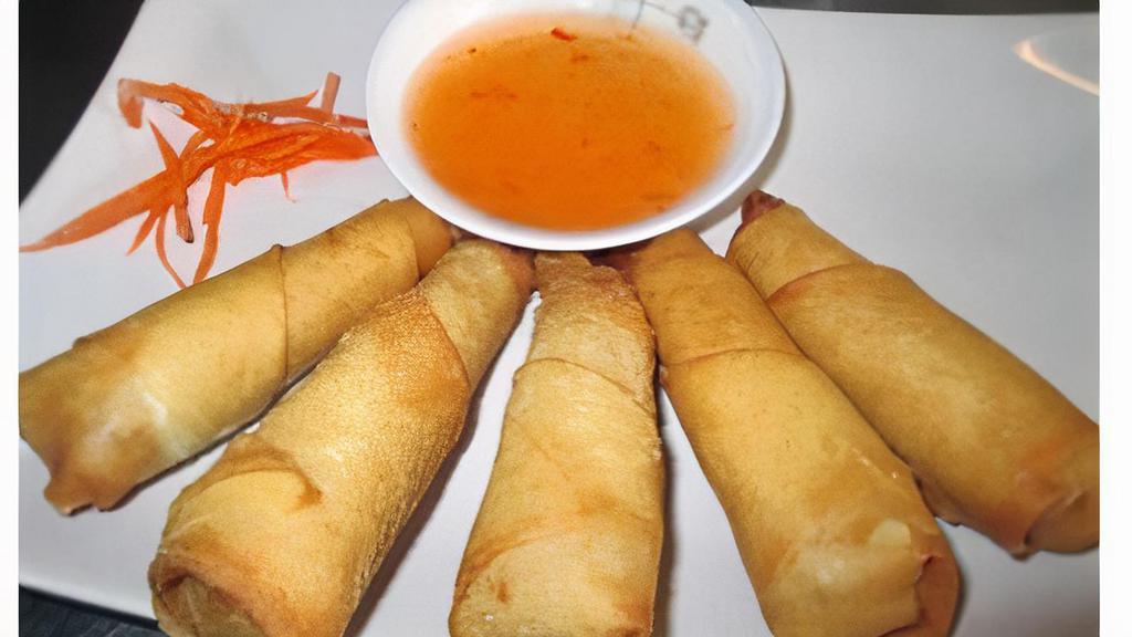 6 Shrimp Blanket · Marinated shrimp wrapped in spring roll paper and deep fried. Served with sweet sour sauce.