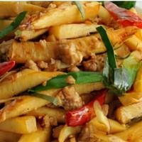 46 Pad Ped · Stir-fried meat with bamboo shoot, bell pepper, basil and green bean in a spicy mix of Thai ...