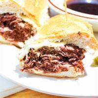 French Dip 1/2 Lb. · fresh sliced roast beef served with real Swiss cheese and au jus.