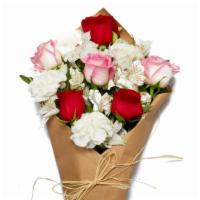 Wrapped Bouquet Red, Pink & White (Shown As Deluxe) · Beautiful pink and red roses wrapped in brown parchment paper along with white carnations an...